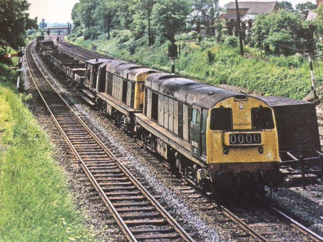 Alex Coomber on Train Siding: A Pair of Class 20s. 20152 & 20175 passes Syston South Junction with a Mixed Freight on 8th June 1977.