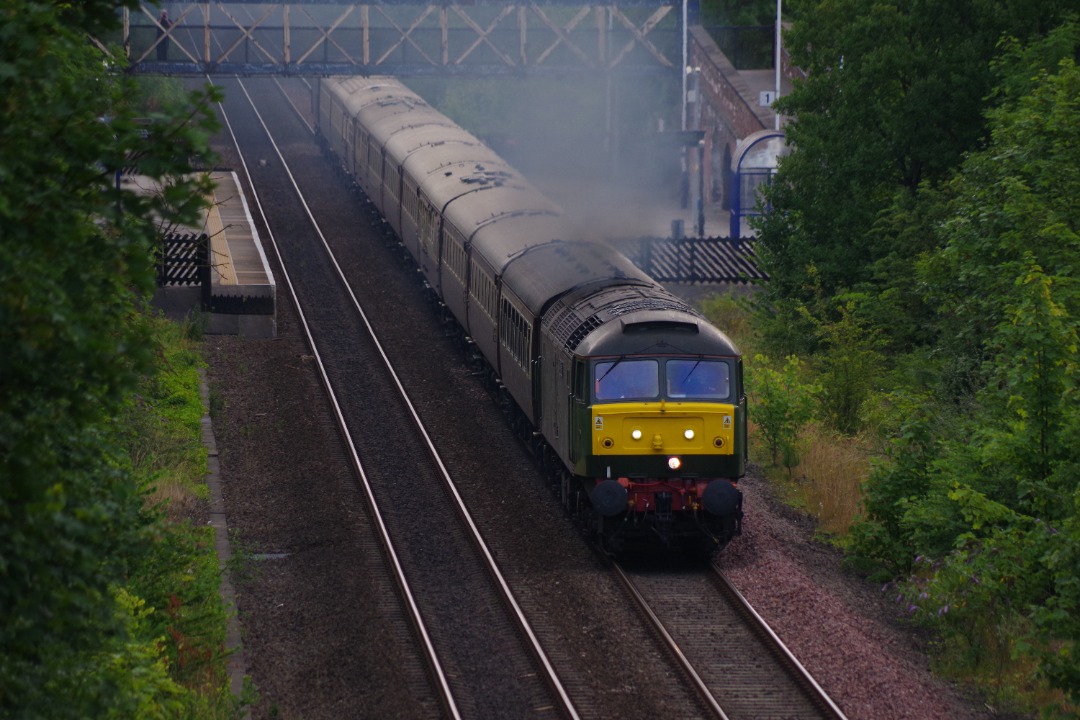 James Wells on Train Siding: 47815 storms through Hessle station with a Hull to Winchester excursion, 1Z74, with 47826 on the rear. 23rd July 2022.