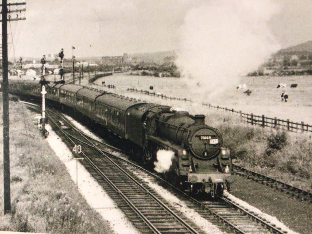 Alex Coomber on Train Siding: A BR Standard Class 5MT 4-6-0 No. 73100 negotiates Lostock Hall Junction south of Preston with the Summer Saturdays from Dundee
to...