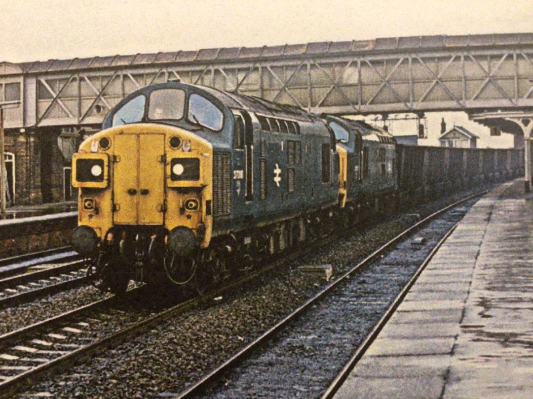 Alex Coomber on Train Siding: A Pair of Class 37s. 37018 and 37191 passes Selby with Iron Ore Tipplers on 19th November 1977.