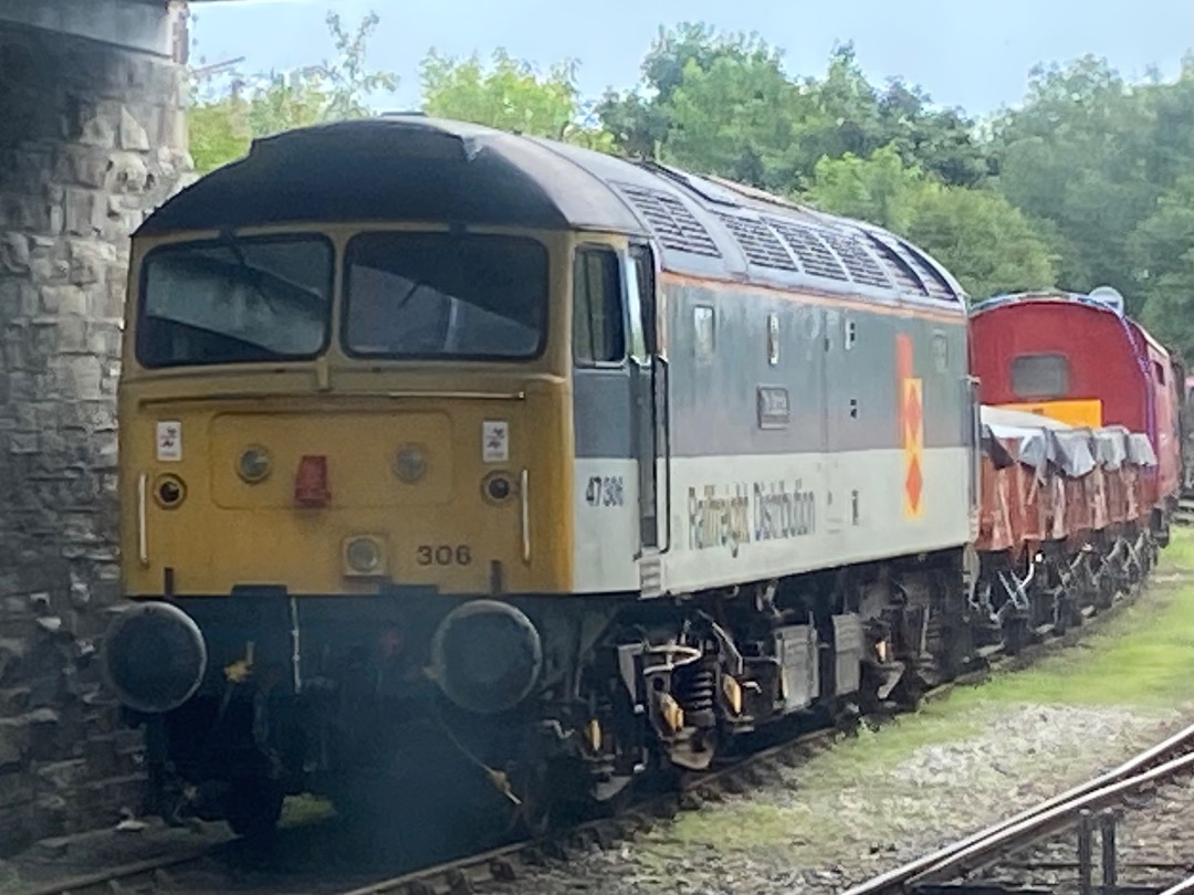 Yrag Sival on Train Siding: 47 306 'The Sapper' stabled with other preserved rolling stock at Bodmin Railway, Cornwall. Taken 31st July 2024.