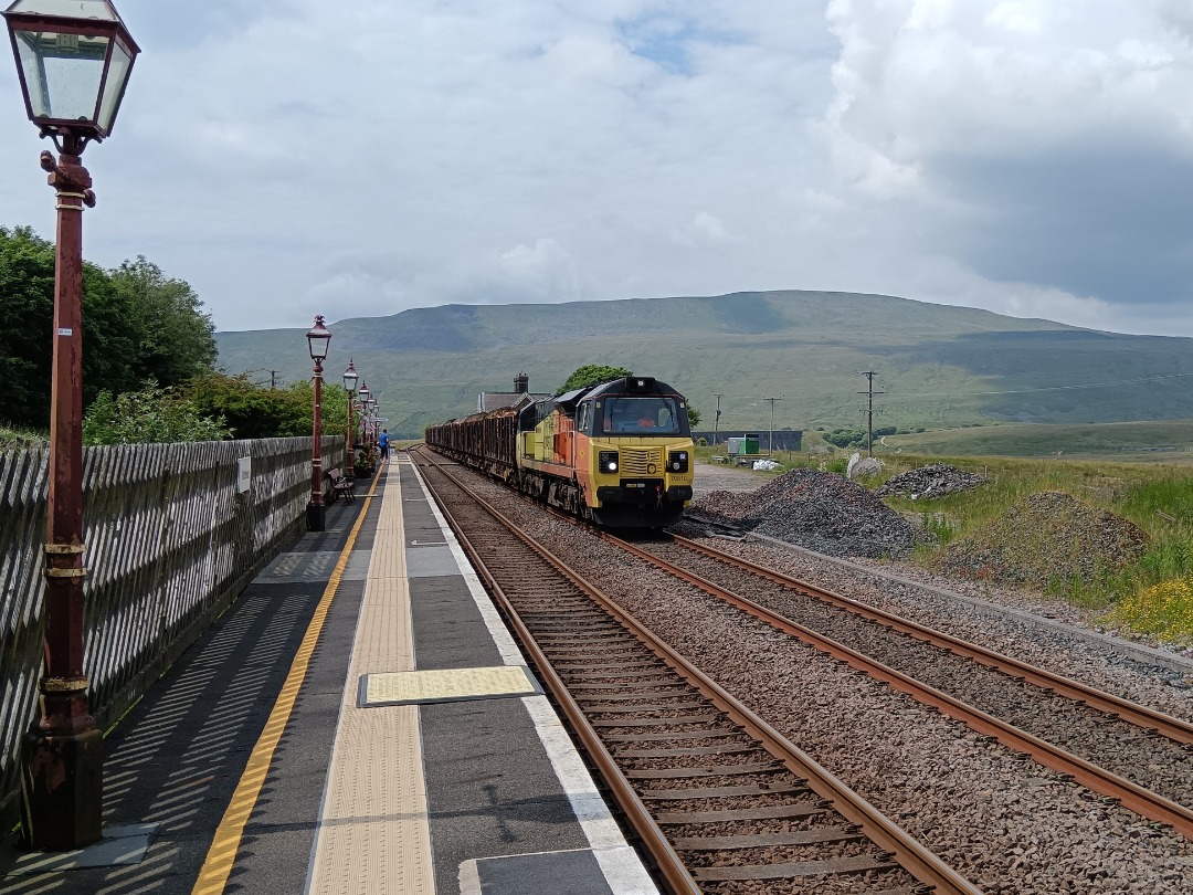 Whistlestopper on Train Siding: Colas Rail class 70/8 No. #70810 passing Ribblehead this afternoon working 6J37 1252 Carlisle Yard to Chirk Kronospan.