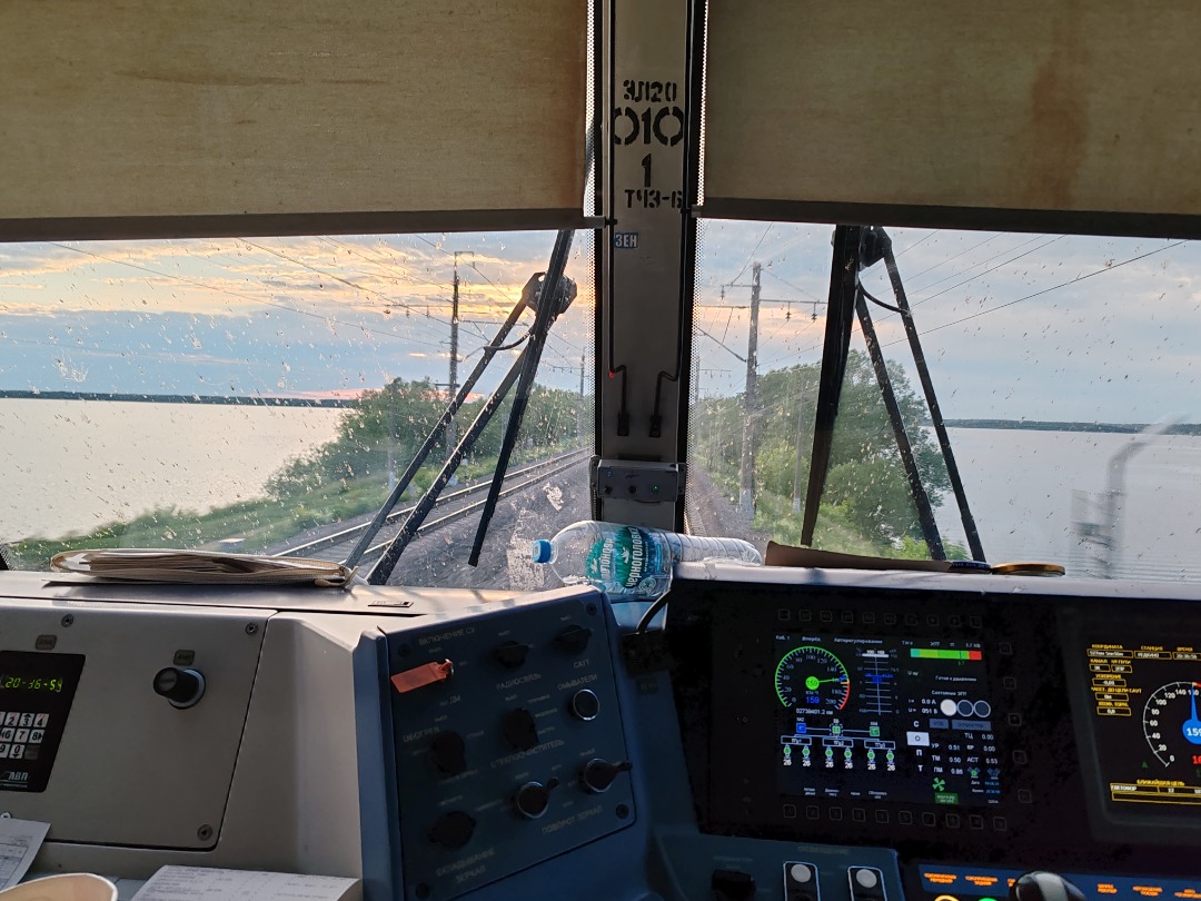 CHS200-011 on Train Siding: View from the cabin of the electric locomotive EP20-010 with high-speed train No. 748 "Nevsky Express" Moscow - St.
Petersburg. Distance...