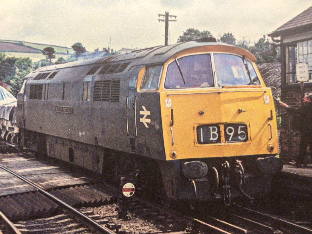 Alex Coomber on Train Siding: A Class 52 D1053 Western Patriarch passes Lostwithiel with the empty China Clays on 14th July 1975.