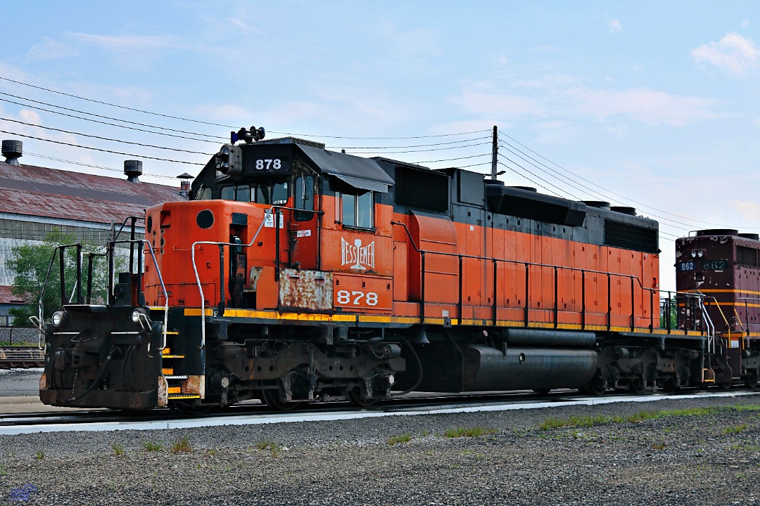 Randall Meadows on Train Siding: Bessemer & Lake Erie 878 is the only B&LE unit (in B&LE paint) still on orignal B&LE trackage seen here in the
locomotive shops in...