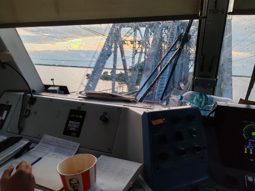 CHS200-011 on Train Siding: View from the cabin of the electric locomotive EP20-010 with high-speed train No. 748 "Nevsky Express" Moscow - St.
Petersburg. Distance...