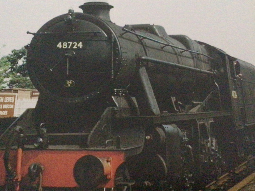 Alex Coomber on Train Siding: Not long after a works overhaul. A Shrewsbury based Stanier 8F locomotive pauses at Builth Road High Level Station with a
southbound...