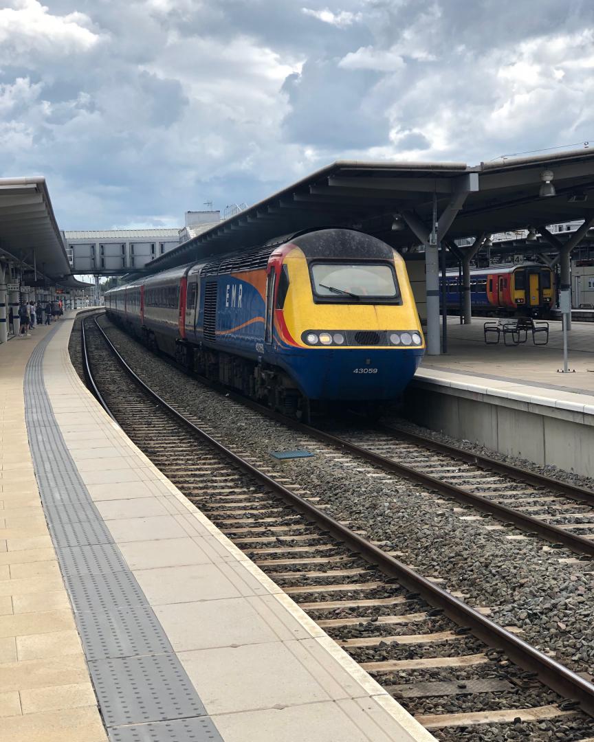 6j57 on Train Siding: East Midlands railway intercity power car 43059 stands ready to shunt on to derby etches park with 43076 on the rear after working the
jolly...