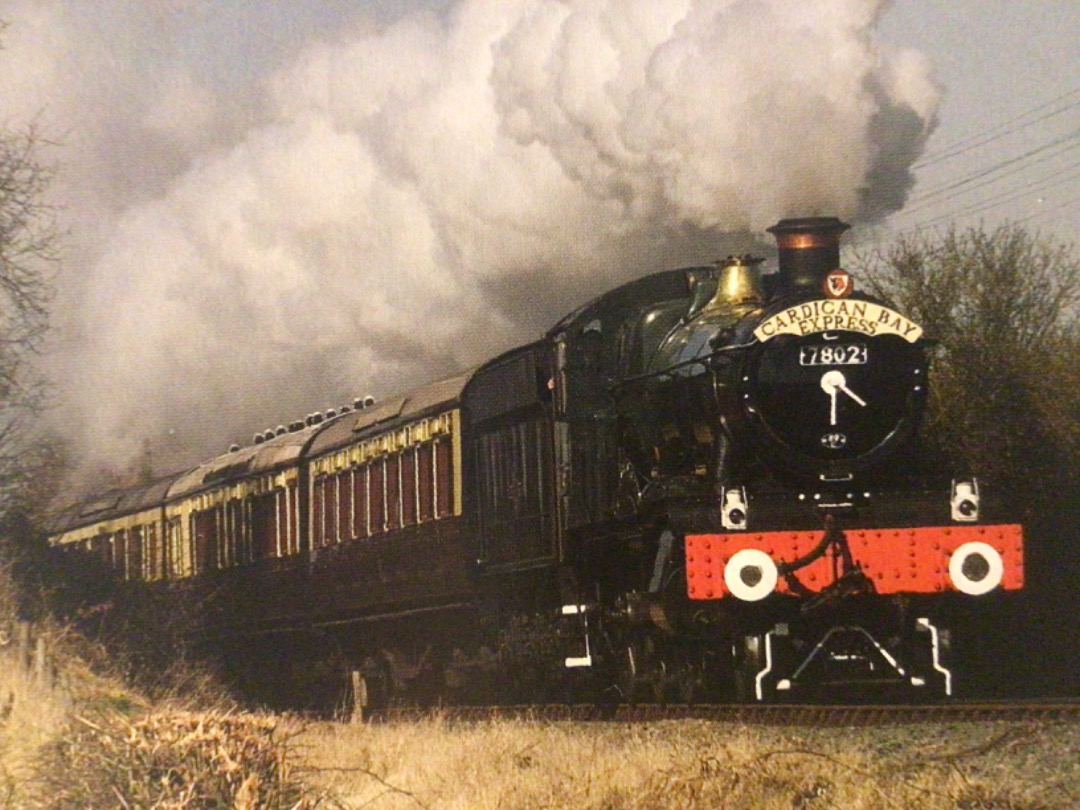 Alex Coomber on Train Siding: An ex GWR Manor Class 4-6-0 No. 7802 Bradley Manor appears in fine fettle with the rolling stock of the Cardigan Bay Express on
the...