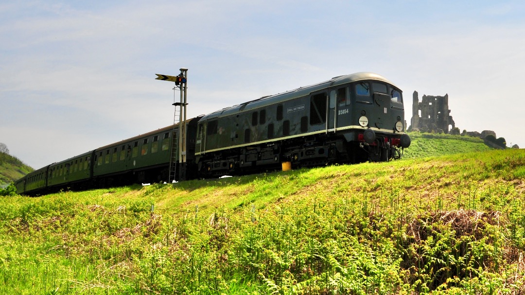 Michael Gates on Train Siding: Class 24, D5054 (24054) 'Phil Southern' frames Corfe Castle with a North bound service to Norden at the Swanage Diesel
Gala Friday 10th...