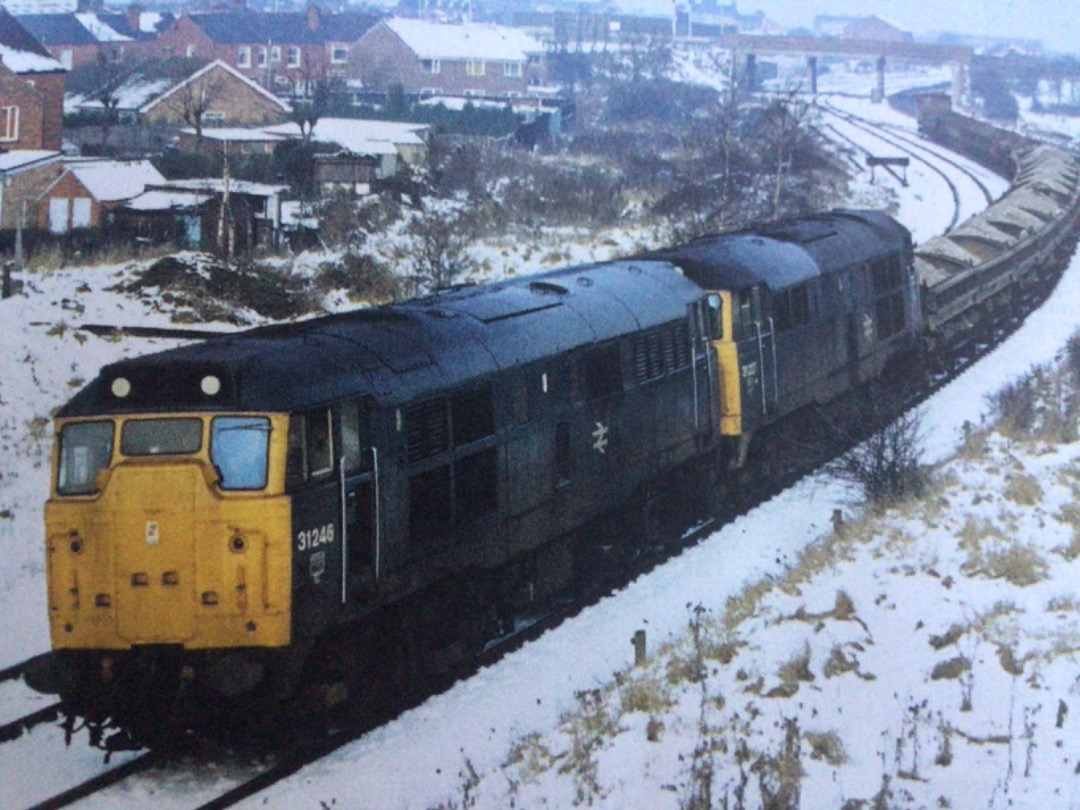 Alex Coomber on Train Siding: A Pair of Class 31s. 31246 & 31227 passes Newark with the ballast train on 6th January 1979.