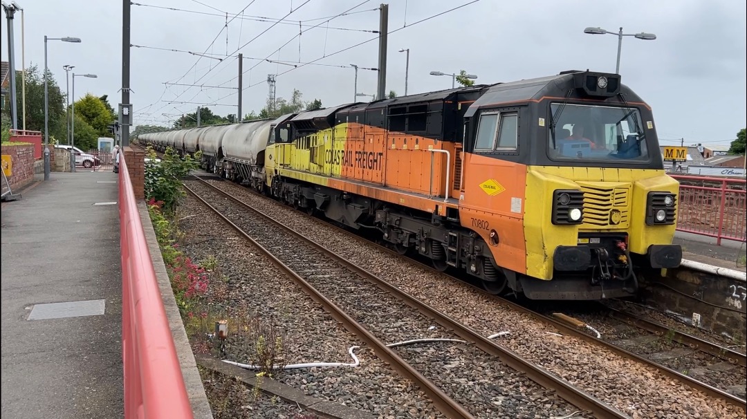 Diesel Shunter on Train Siding: 70 802 seen at East Boldon on a cold and damp 01.07.24, working 6E90 with cement wagons from Oxwellmains Lafarge to Seaham
Harbour